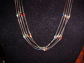 Four chain strand  necklace with semi precious beads