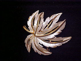 Beautiful vintage JJ goldtone and white maple leaf pin