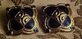 Vintage Trifari gold and black enamel clip earrings