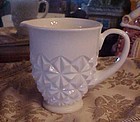 Vintage milk glass pitcher with diamond pattern