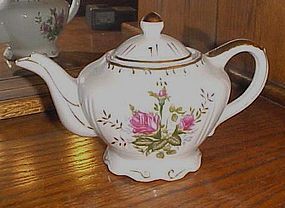 Vintage porcelain Moss Rose musical teapot