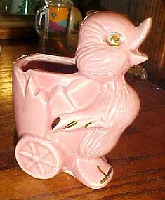 Vintage pink duckling and egg cart planter gold trim