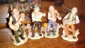 Four piece hand painted Italian musicians band figurines 7 3/4" tall