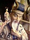 Seymour Mann Collectible Asian Man sitting figurine 8.25"