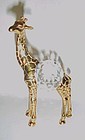 Brass giraffe with crystal prism belly