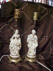 French Colonial white and gold man and woman matching table lamps 40's