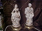 French Colonial white and gold man and woman matching table lamps 40's