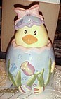 Easter egg cookie jar with hatching chick tulips and Easter eggs