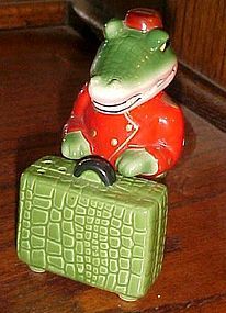Alligator and luggage go with salt and pepper shakers