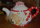 Gingerbread cookies and candy ceramic teapot