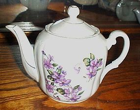 Lovely vintage porcelain teapot with violets