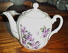 Lovely vintage porcelain teapot with violets
