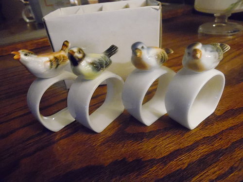 Set of 4 figural porcelain bird napkin rings from House of Global Art