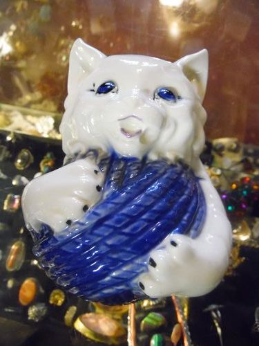 Ceramic cat with yarn ball string holder