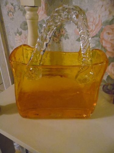 Hand blown glass orange purse vase