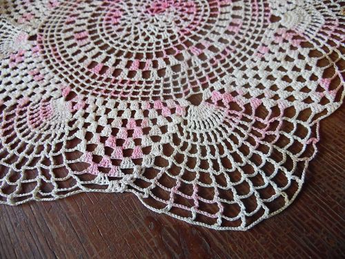 Vintage hand crochet cream and pink varigated round doily 13"