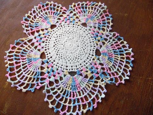 Vintage hand crochet varegated pastel round doily