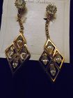 Elegant gold tone rhinestone dangle runway clip earrings