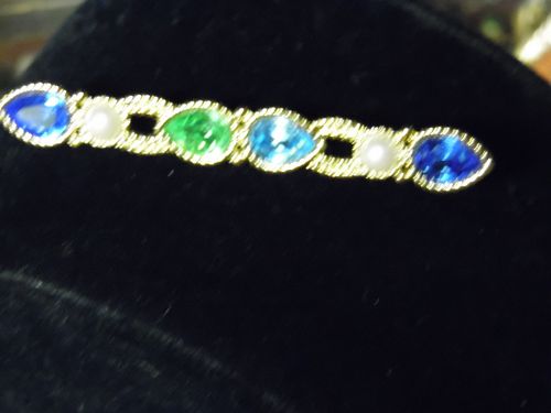 Beautiful Monet gold tone rhinestone bar pin