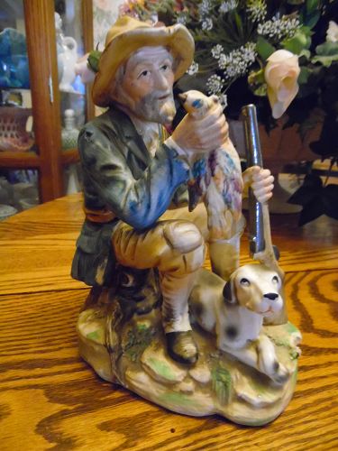 Large vintage Norleans hunter and his dog figurine