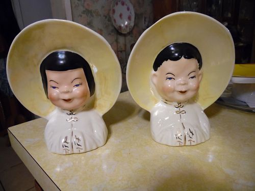 Vintage ceramic Asian boy and girl wall pockets