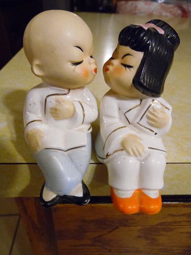Kissing Asian boy and girl shelf sitter salt and pepper shakers