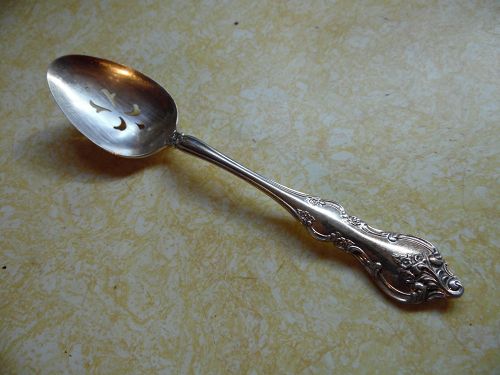 International deep silver ORLEANS pattern pierced serving spoon
