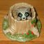 Franklin Mint Woodland Surprises Raccoon in stump figurines 1984
