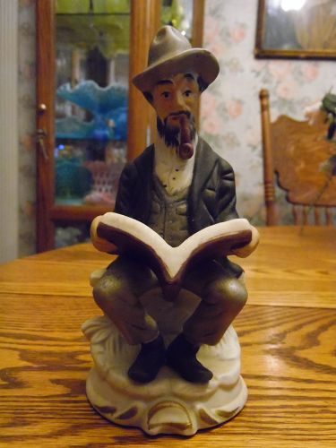 Homco style Seated man with pipe reading book figurine