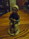 Homco style old lady with broom porcelain  figurine