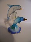 Blown glass leaping dolphins frosted with rhinestone eyes