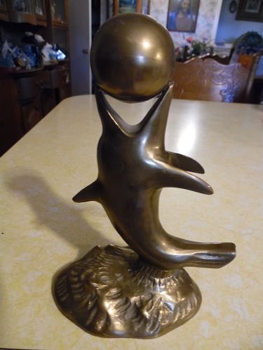 Vintage solid brass dolphin with ball figurine 8.25"