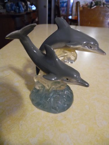 Realistic resin double leaping dolphins figurine