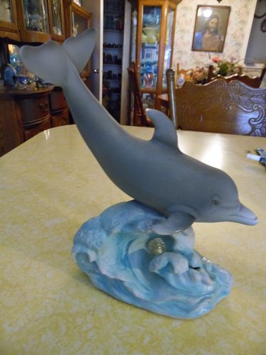 Large bisque porcelain dolphin figurine