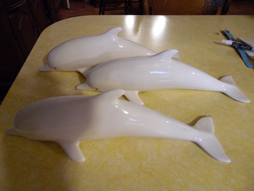 Ceramic white dolphins 3-d wall decor