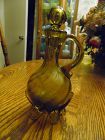 Vintage hand blown olive green cruet with 5 feet