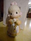 Avon Precious Moments Love is the key figurine