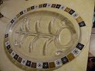 Inland clear glass meat platter with mid century atomic pattern edge