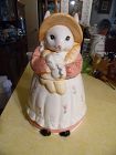 Country bunny rabbit in calico dress cookie jar