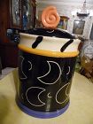 Large black cookie jar with crescent moons and candy finial  LA CA