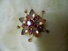 Vintage  goldtone pink  flower star pin with rhinestones