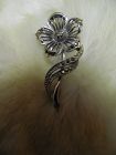 Lovely silver tone marcasite flower pin