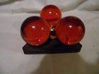 Vintage lucite resin amber ball candle stick holder