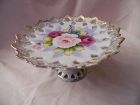 Hand painted ceramic dessert stand with roses reticulated border