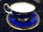 Aynsley cobalt blue and gold teacup and saucer England