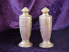 Tall filigree porcelin shakers