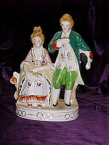 Double colonial couple figurine