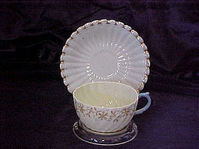 Beleek style cup and saucer ??