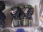 wooden golliwog shakers