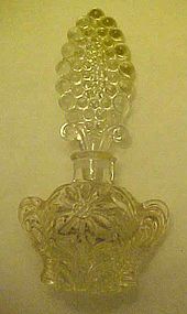 Fancy perfume bottle with daisy pattern